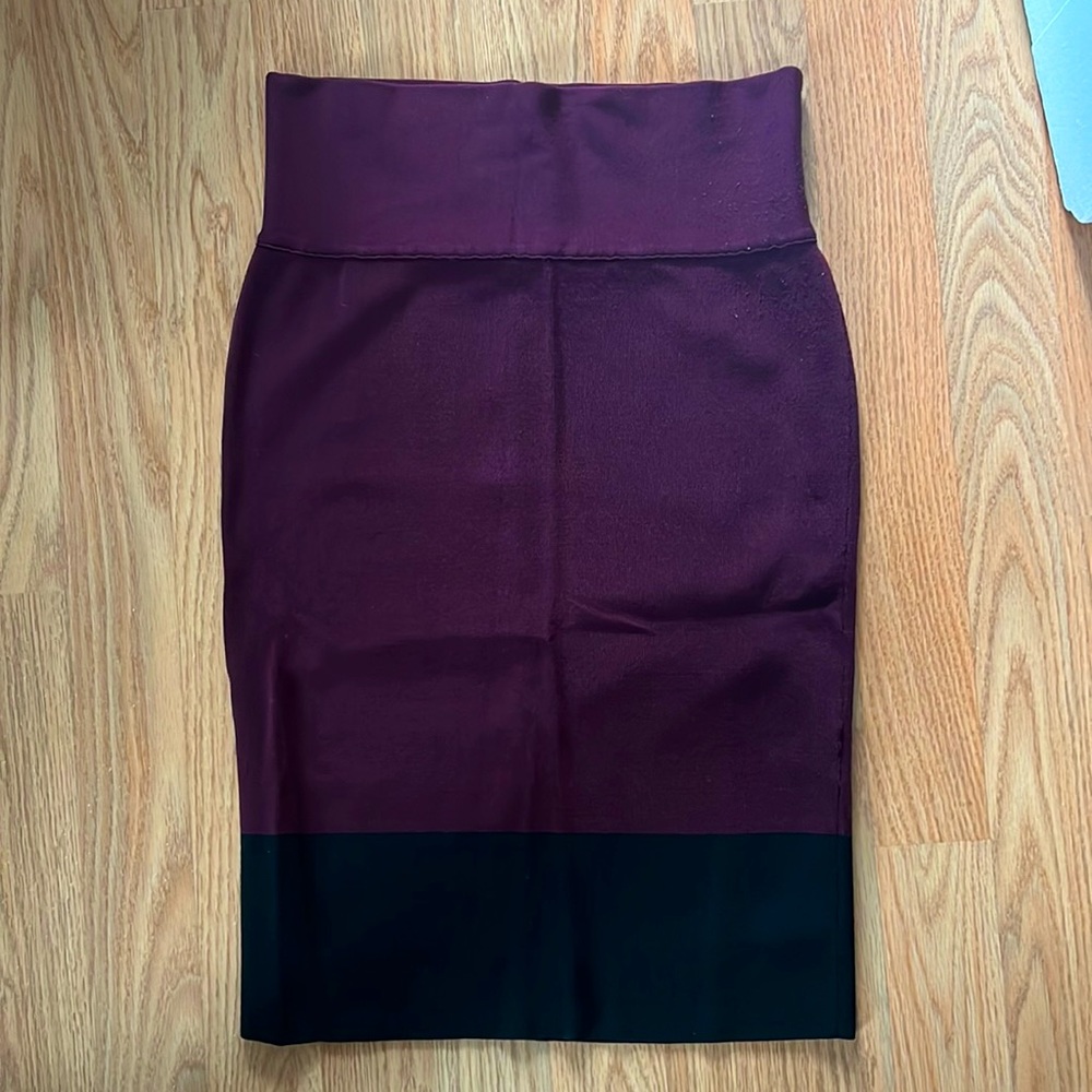 Size small black and purple skirt - in great condition - tight knee length